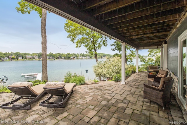 7025 Dandison Blvd, West Bloomfield, MI 48324 - view of patio featuring a water view