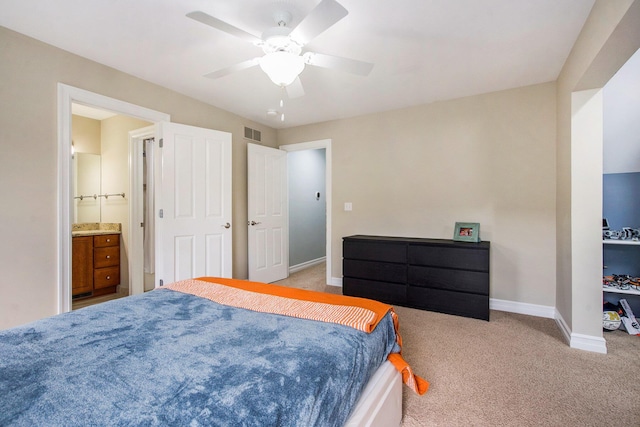6577 Heron Ct, Ann Arbor, MI 48103 - bedroom with carpet floors, ceiling fan, and ensuite bath