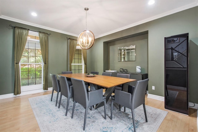 6577 Heron Ct, Ann Arbor, MI 48103 - dining area featuring a chandelier, stairs, light wood finished floors, crown molding, and recessed lighting