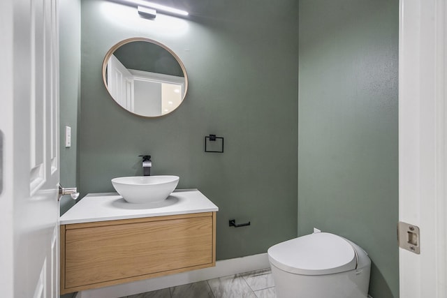 6577 Heron Ct, Ann Arbor, MI 48103 - half bathroom with vanity and marble look tiles