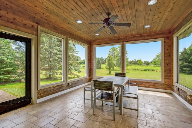 6577 Heron Ct, Ann Arbor, MI 48103 - sunroom / solarium featuring recessed lighting, stone tile flooring, a ceiling fan, wooden ceiling, and outdoor dining area
