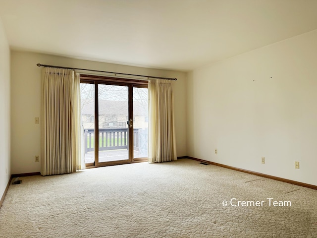 4074 Grandview Ter SW, Grandville, MI 49418 - carpeted spare room featuring baseboards