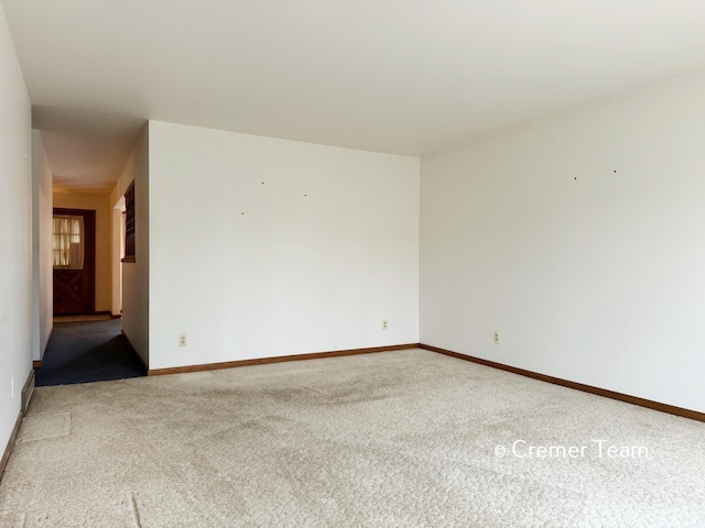 4074 Grandview Ter SW, Grandville, MI 49418 - carpeted spare room featuring baseboards