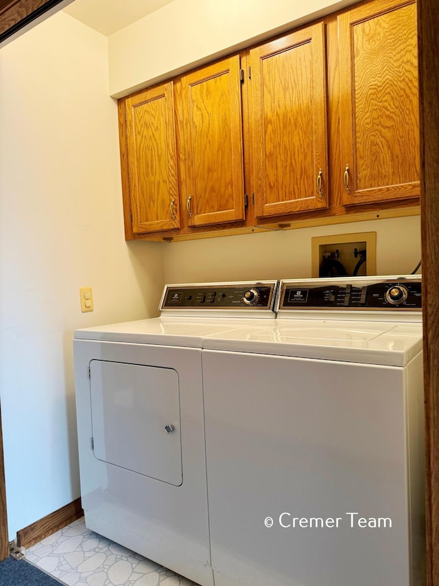 4074 Grandview Ter SW, Grandville, MI 49418 - washroom with cabinet space and washer and clothes dryer