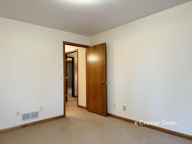 4074 Grandview Ter SW, Grandville, MI 49418 - unfurnished room featuring light colored carpet and baseboards