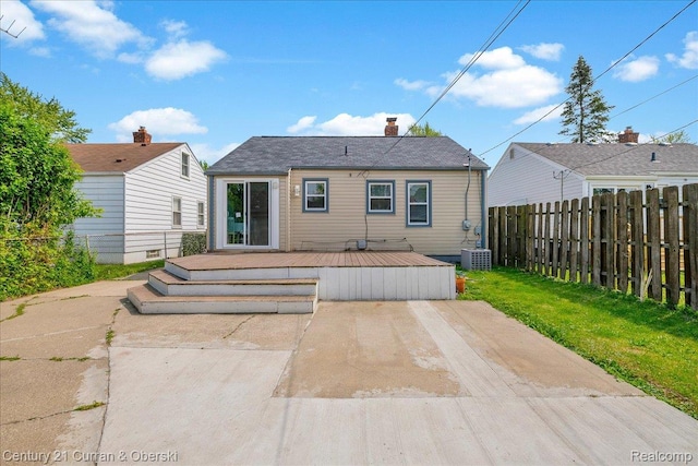 1678 Merrill Ave, Lincoln Park, MI 48146 - back of house featuring a wooden deck and a chimney