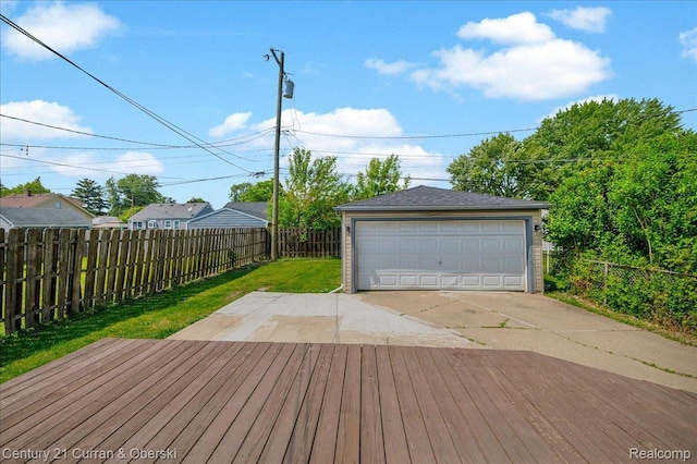1678 Merrill Ave, Lincoln Park, MI 48146 - wooden deck with a detached garage, an outdoor structure, and a fenced backyard