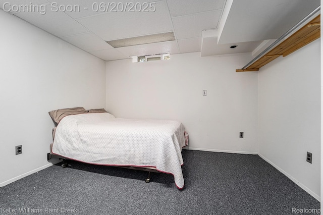 12141 Danforth Dr, Sterling Heights, MI 48312 - carpeted bedroom featuring a drop ceiling and baseboards