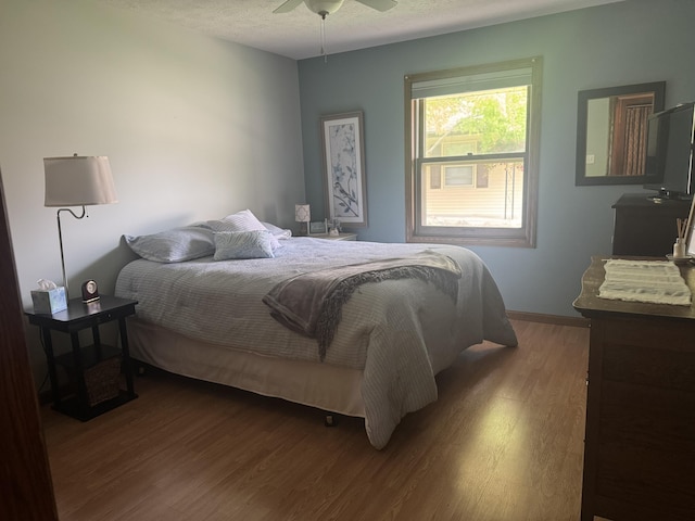 7337 Pine Grove Dr, Jenison, MI 49428 - bedroom featuring wood finished floors and ceiling fan
