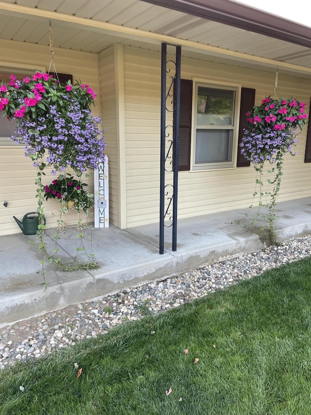 7337 Pine Grove Dr, Jenison, MI 49428 - view of exterior entry featuring covered porch