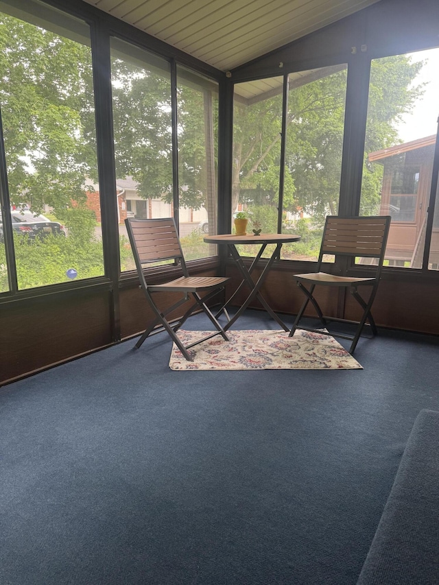 7337 Pine Grove Dr, Jenison, MI 49428 - sunroom with plenty of natural light, carpet, and lofted ceiling