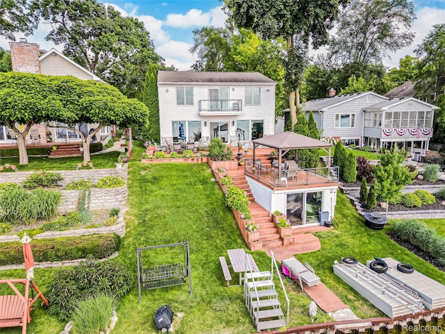 7660 Barnsbury Dr, West Bloomfield, MI 48324 - rear view of property featuring a balcony, stairway, a lawn, a gazebo, and a deck