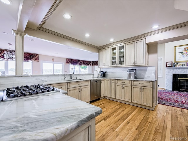 7660 Barnsbury Dr, West Bloomfield, MI 48324 - kitchen with stainless steel appliances, crown molding, light stone counters, backsplash, and recessed lighting