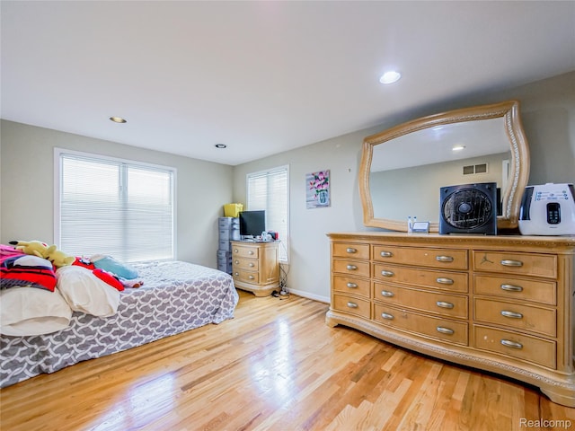 7660 Barnsbury Dr, West Bloomfield, MI 48324 - bedroom with light wood-style flooring and recessed lighting