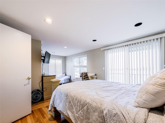 7660 Barnsbury Dr, West Bloomfield, MI 48324 - bedroom with wood finished floors and recessed lighting