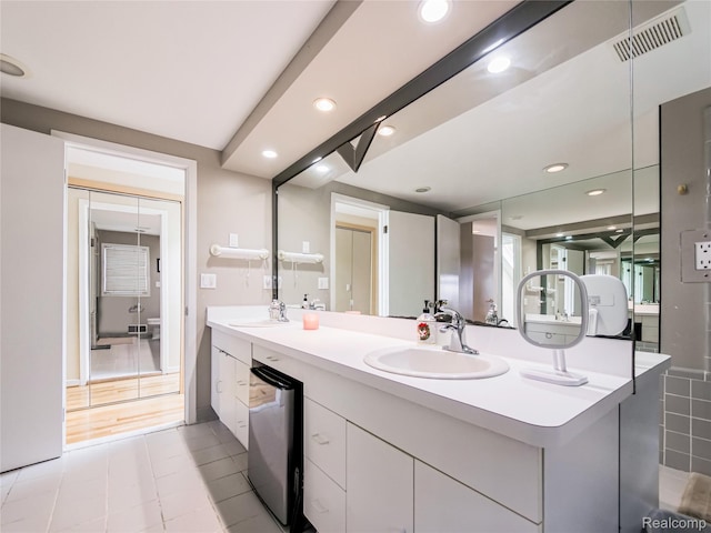 7660 Barnsbury Dr, West Bloomfield, MI 48324 - full bath featuring double vanity, tile patterned flooring, and recessed lighting