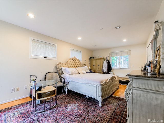 7660 Barnsbury Dr, West Bloomfield, MI 48324 - bedroom with wood finished floors and recessed lighting
