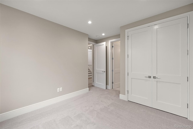 345 Kimberly St, Birmingham, MI 48009 - unfurnished bedroom with light carpet, recessed lighting, and a closet