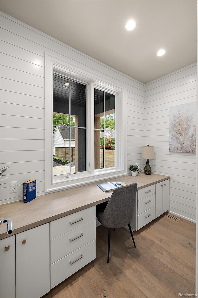 345 Kimberly St, Birmingham, MI 48009 - office with built in desk, wood finished floors, recessed lighting, and wood walls