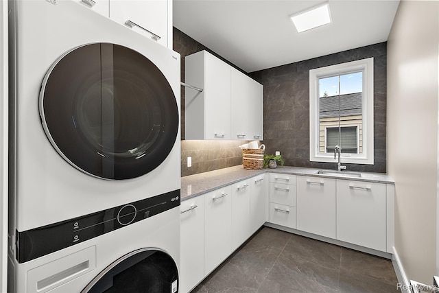 345 Kimberly St, Birmingham, MI 48009 - washroom featuring estacked washer and dryer and cabinet space