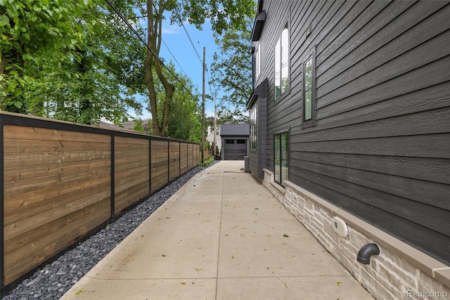 345 Kimberly St, Birmingham, MI 48009 - view of side of property featuring a fenced backyard and a patio