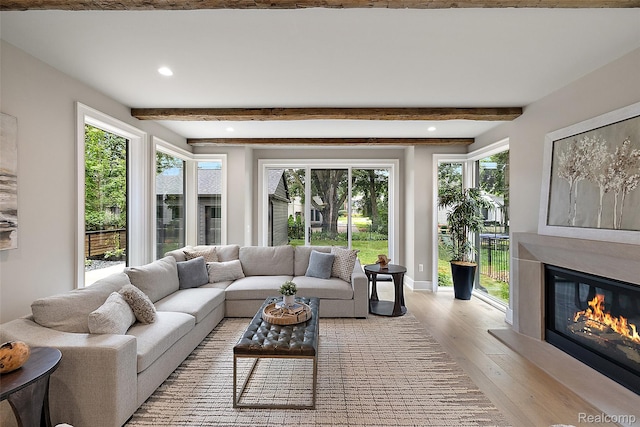 345 Kimberly St, Birmingham, MI 48009 - living area featuring recessed lighting, light wood-style flooring, beamed ceiling, and a glass covered fireplace