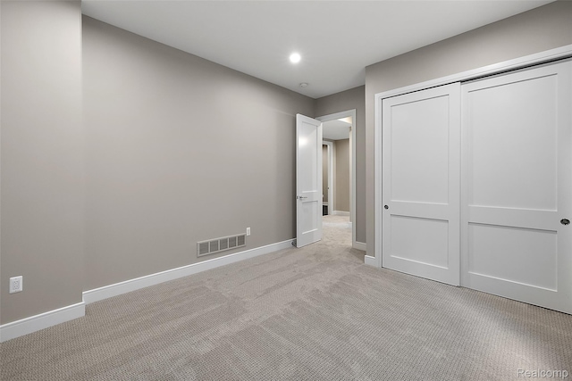 345 Kimberly St, Birmingham, MI 48009 - unfurnished bedroom with light carpet, a closet, and recessed lighting