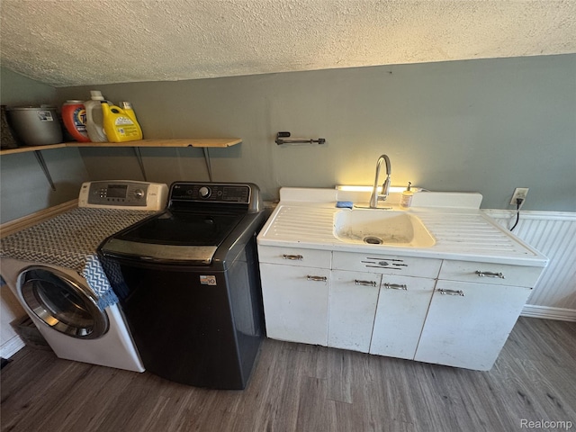 6351 Zimmer Rd, Haslett, MI 48840 - laundry room with dark wood finished floors, washing machine and clothes dryer, and a textured ceiling