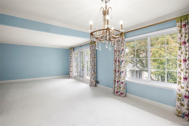 42309 Woodward Ave Unit S1-7, Bloomfield Hills, MI 48304 - empty room featuring a chandelier, ornamental molding, and carpet flooring