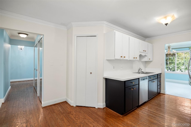 42309 Woodward Ave Unit S1-7, Bloomfield Hills, MI 48304 - kitchen with stainless steel dishwasher, a chandelier, wood finished floors, light countertops, and white cabinetry