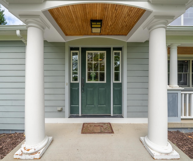 4641 Wylie Rd, Dexter, MI 48130 - doorway to property with covered porch