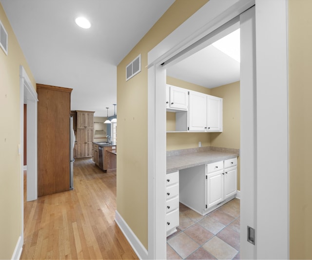 4641 Wylie Rd, Dexter, MI 48130 - hall featuring light wood-style floors and recessed lighting