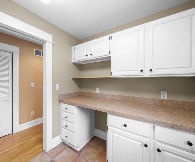 4641 Wylie Rd, Dexter, MI 48130 - unfurnished office featuring built in study area and baseboards