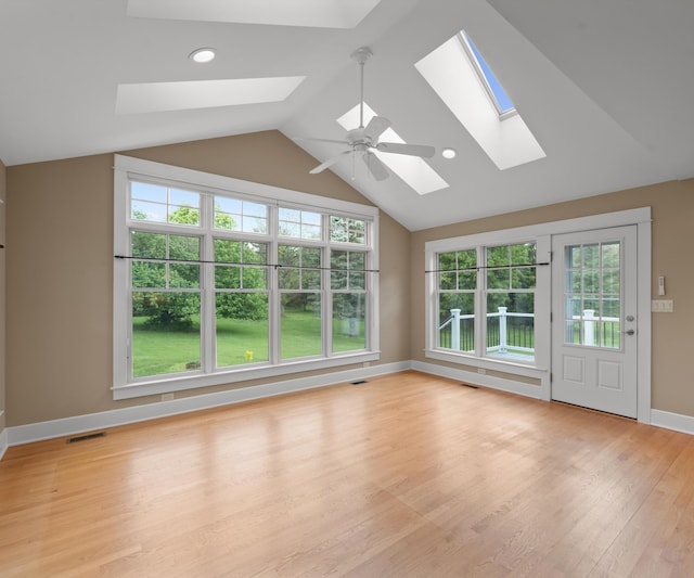 4641 Wylie Rd, Dexter, MI 48130 - unfurnished sunroom featuring a skylight and lofted ceiling