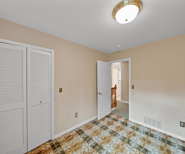4641 Wylie Rd, Dexter, MI 48130 - unfurnished bedroom with a closet and baseboards
