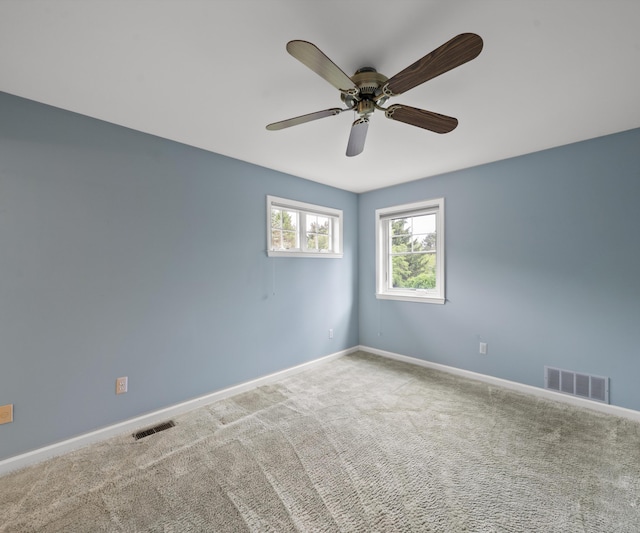 4641 Wylie Rd, Dexter, MI 48130 - carpeted spare room with baseboards and ceiling fan