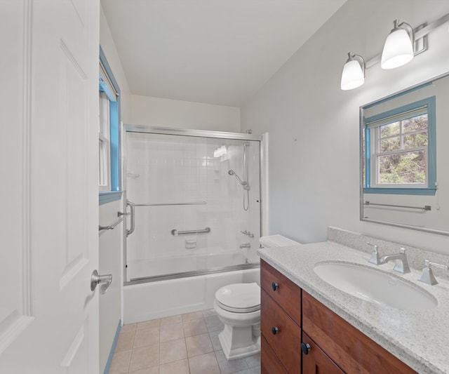 4641 Wylie Rd, Dexter, MI 48130 - full bathroom with vanity, tile patterned flooring, and enclosed tub / shower combo