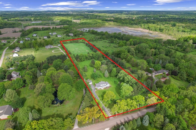 4641 Wylie Rd, Dexter, MI 48130 - aerial overview of property's location with property boundaries highlighted and a heavily wooded area