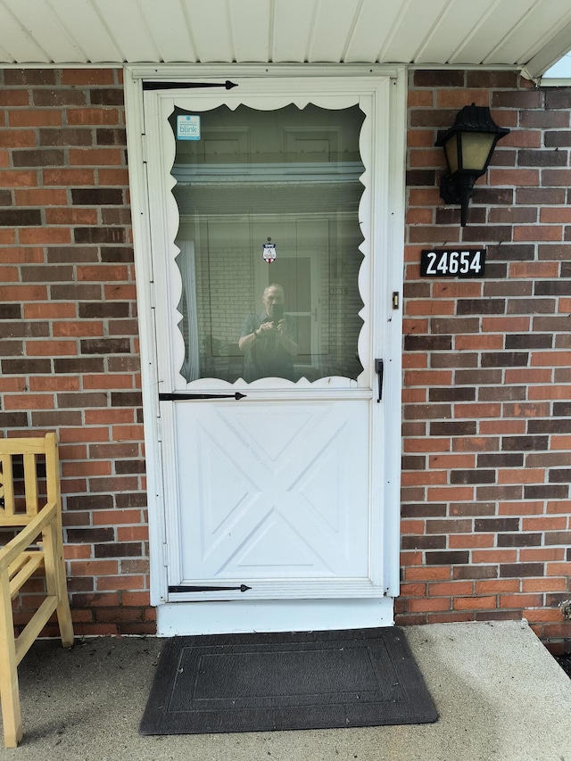 24654 Spring Ln, Harrison Township, MI 48045 - property entrance with brick siding