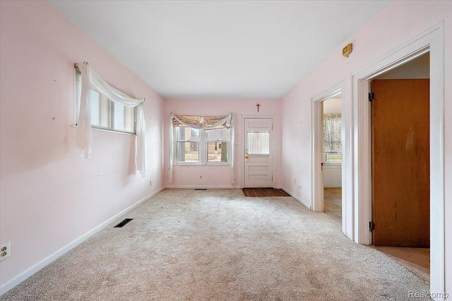2124 Catalpa Dr, Berkley, MI 48072 - carpeted empty room featuring healthy amount of natural light