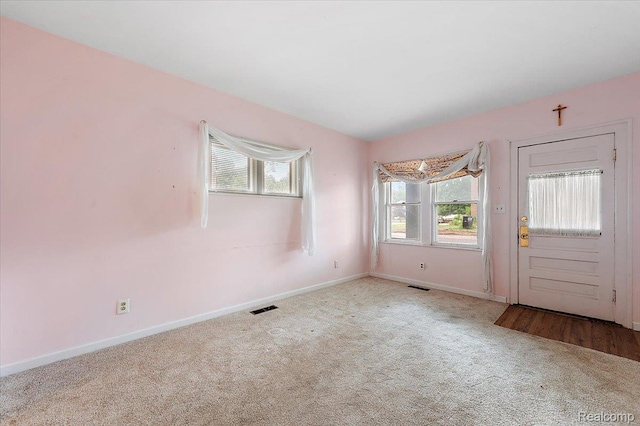 2124 Catalpa Dr, Berkley, MI 48072 - carpeted foyer featuring baseboards