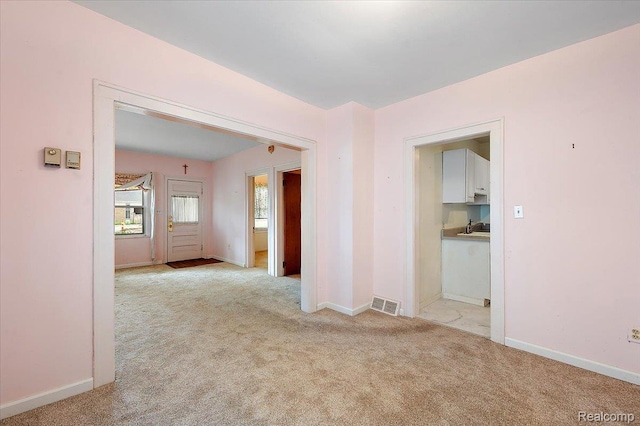 2124 Catalpa Dr, Berkley, MI 48072 - spare room with light colored carpet and baseboards