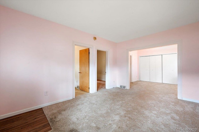 2124 Catalpa Dr, Berkley, MI 48072 - unfurnished bedroom featuring a closet and carpet floors