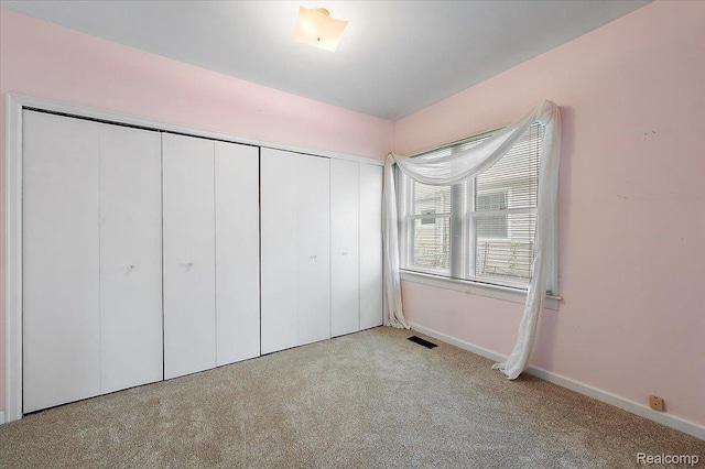 2124 Catalpa Dr, Berkley, MI 48072 - unfurnished bedroom featuring carpet and a closet