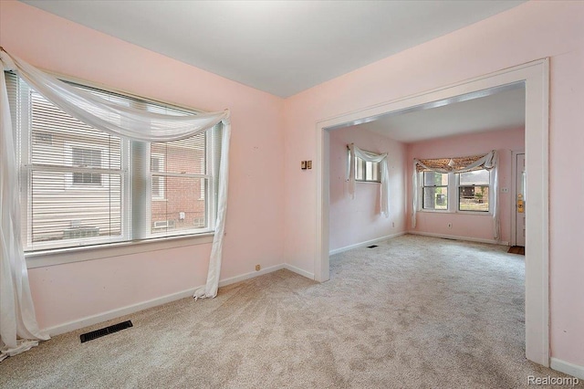 2124 Catalpa Dr, Berkley, MI 48072 - carpeted empty room with baseboards