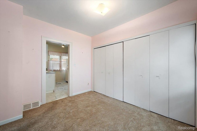2124 Catalpa Dr, Berkley, MI 48072 - unfurnished bedroom featuring carpet flooring and a closet