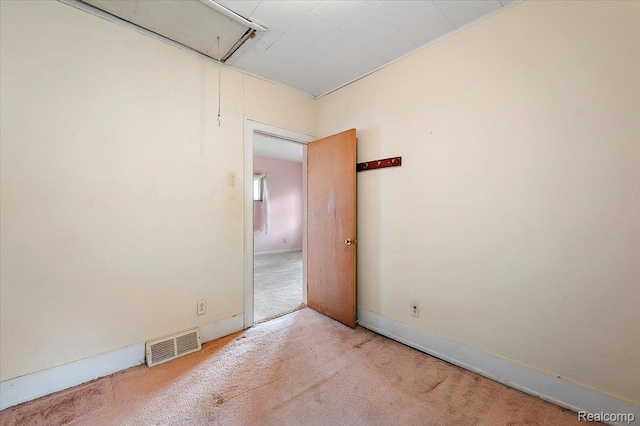 2124 Catalpa Dr, Berkley, MI 48072 - carpeted spare room with attic access