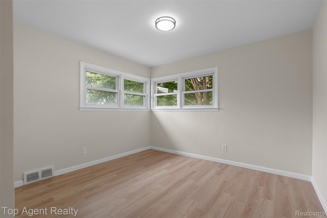 19005 Lister Ave, Eastpointe, MI 48021 - empty room featuring light wood-type flooring and baseboards