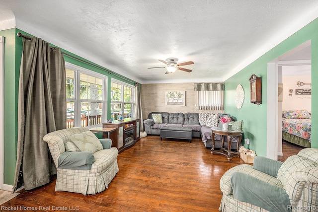 35221 Weideman St, Clinton Township, MI 48035 - living room with ceiling fan, wood finished floors, and a textured ceiling