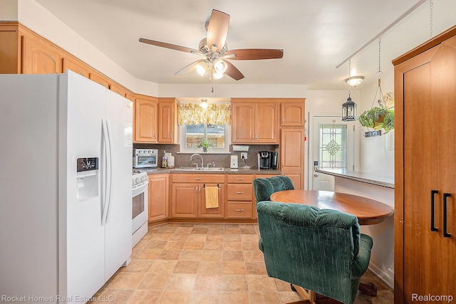 35221 Weideman St, Clinton Township, MI 48035 - kitchen with white appliances, decorative backsplash, a ceiling fan, and stone finish flooring